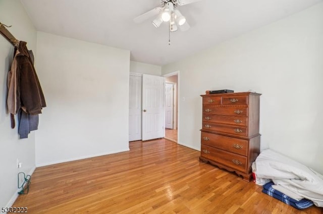 bedroom with ceiling fan and light wood-type flooring