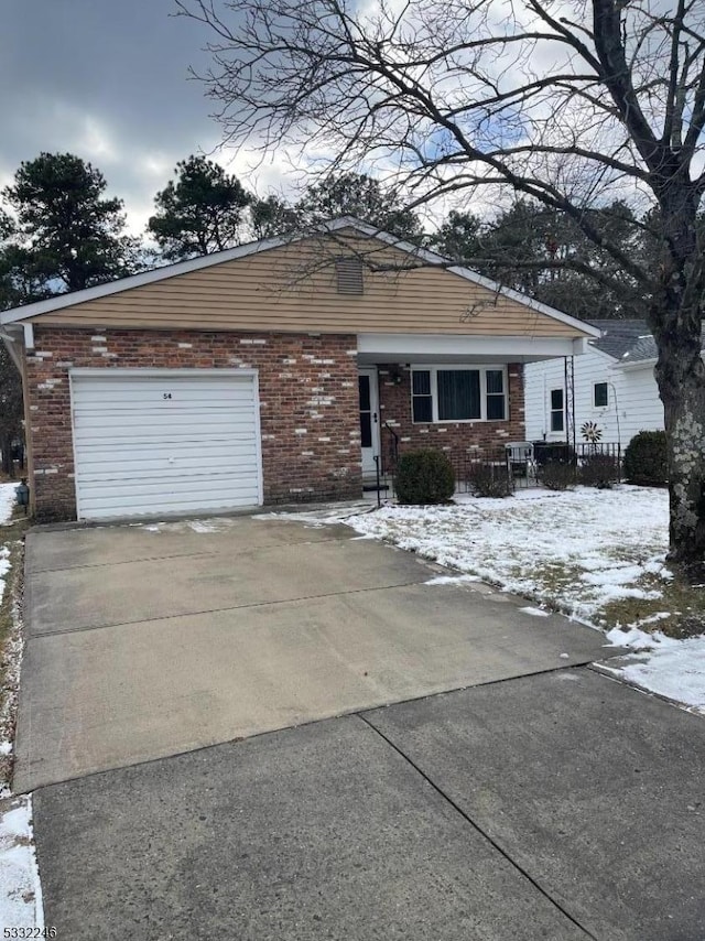 single story home featuring a garage