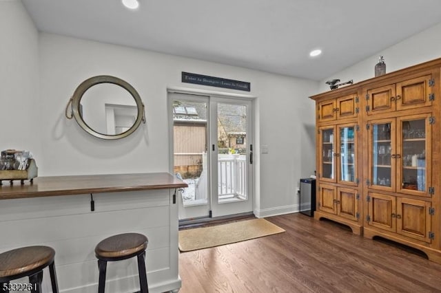 foyer featuring dark hardwood / wood-style floors