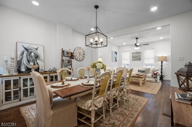 dining space with dark wood-type flooring and ceiling fan