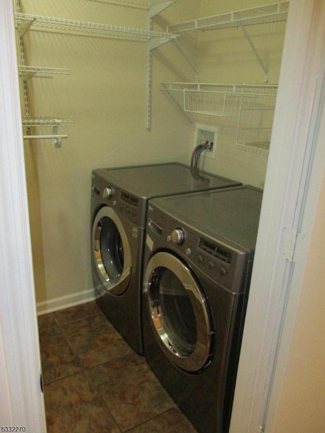 laundry area featuring washer and clothes dryer