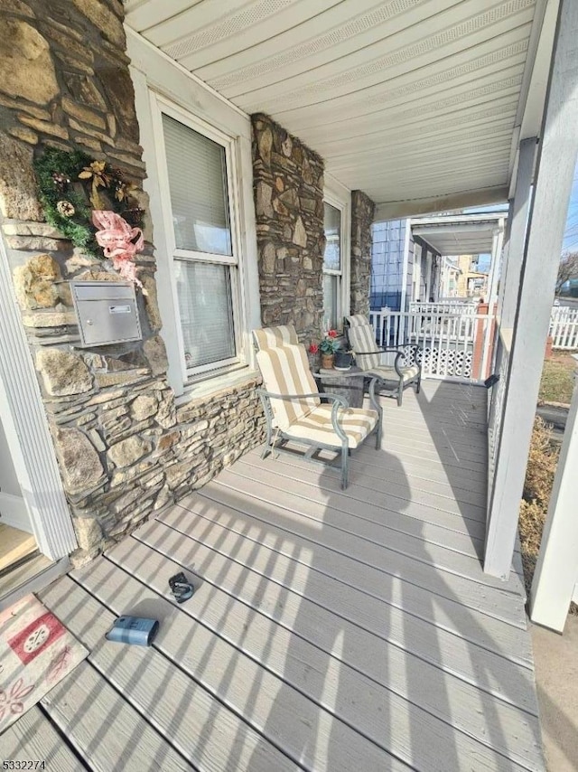 wooden deck with covered porch