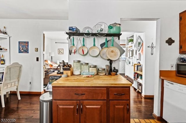 kitchen with butcher block countertops, dishwasher, and dark hardwood / wood-style flooring