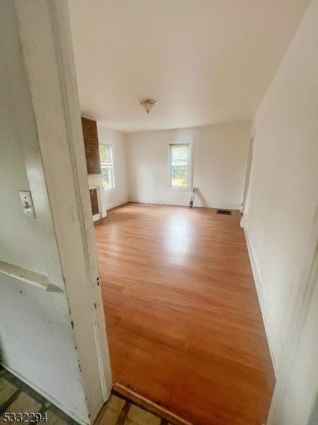 empty room featuring hardwood / wood-style floors