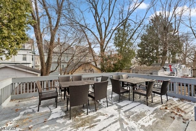 view of snow covered deck