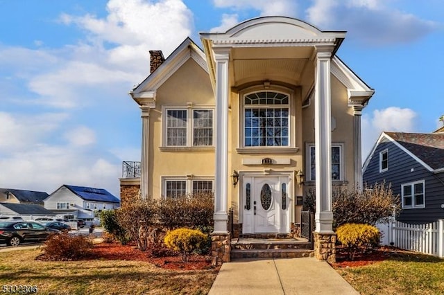 view of neoclassical home