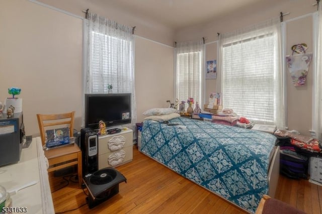 bedroom featuring hardwood / wood-style floors