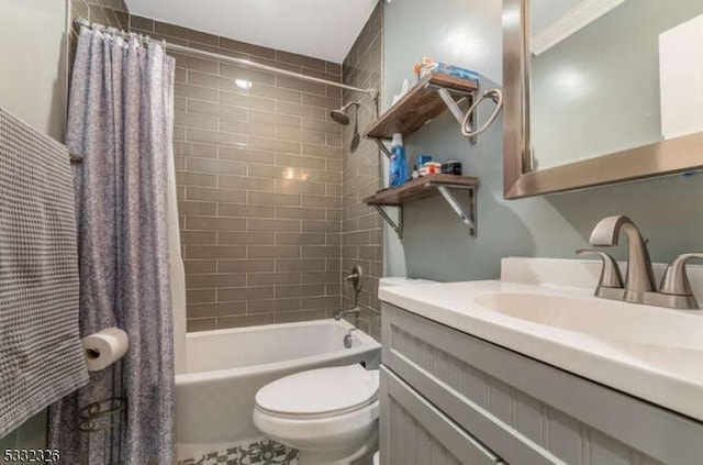 full bathroom featuring shower / tub combo with curtain, vanity, and toilet