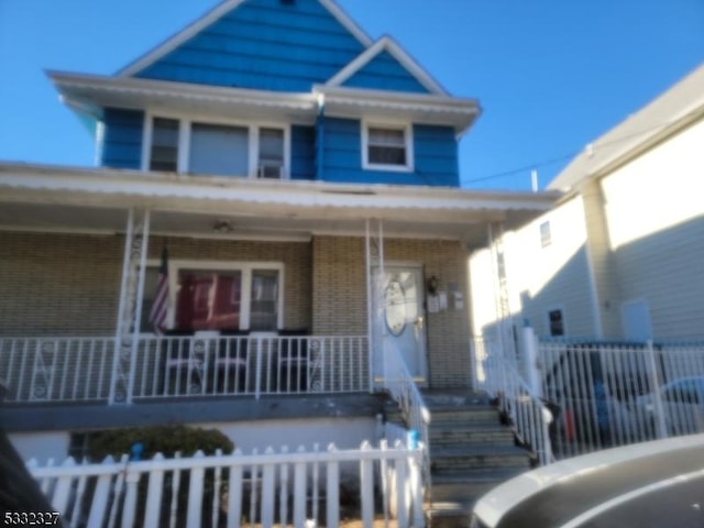 view of front facade with covered porch