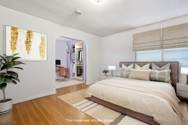 bedroom featuring hardwood / wood-style flooring