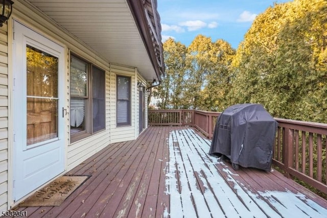 wooden deck with grilling area