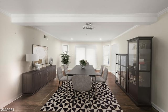 dining room with crown molding and dark hardwood / wood-style flooring