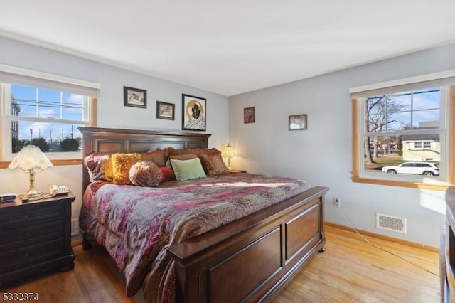 bedroom featuring light wood-type flooring