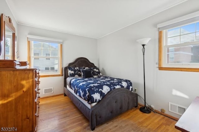 bedroom featuring hardwood / wood-style flooring