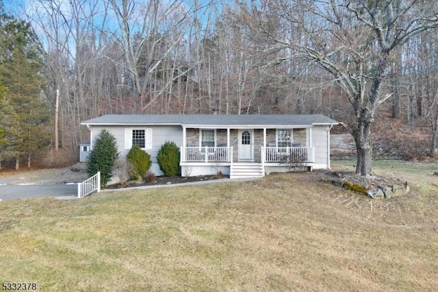 single story home with a porch and a front lawn