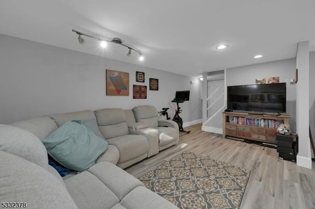 living room with light hardwood / wood-style flooring