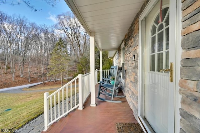 balcony featuring covered porch