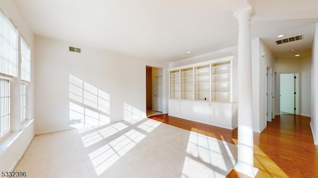 empty room with ornate columns