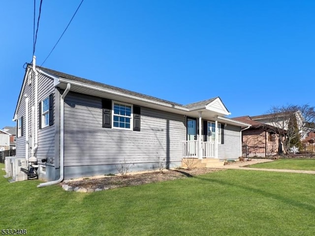 ranch-style home with a front lawn