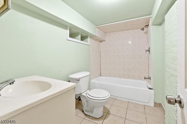 full bathroom with toilet, vanity, tile patterned floors, and tiled shower / bath combo