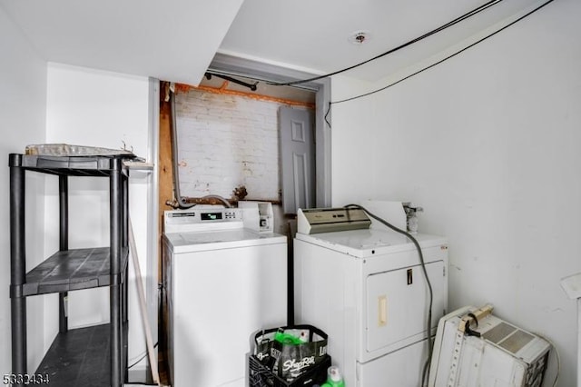 laundry room featuring independent washer and dryer