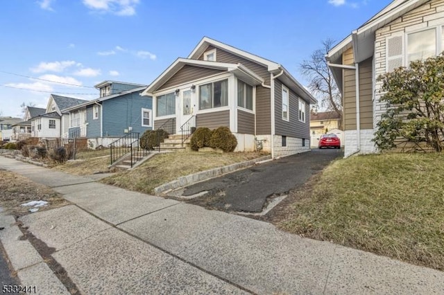 view of front of home with a front yard