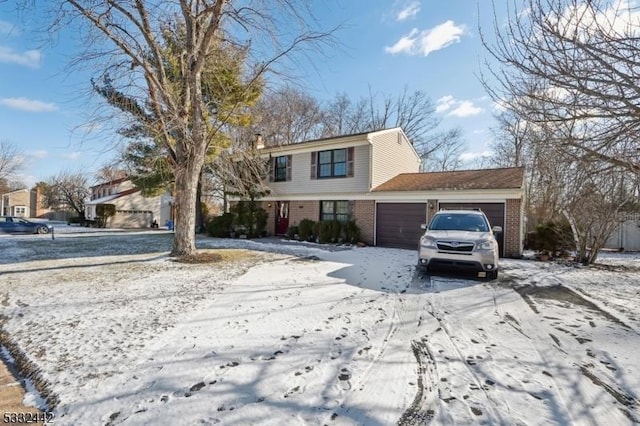 front of property with a garage