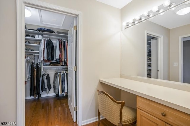 bathroom with hardwood / wood-style flooring