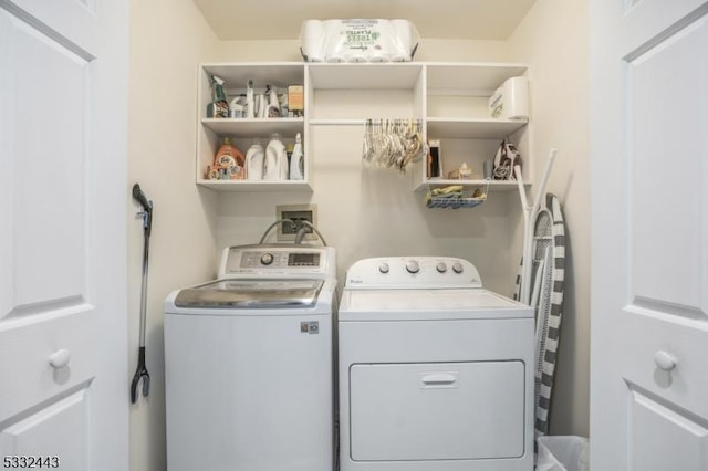 washroom featuring separate washer and dryer