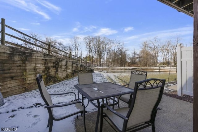 view of snow covered patio