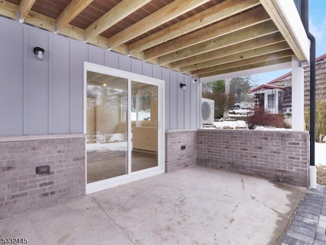 view of snow covered patio