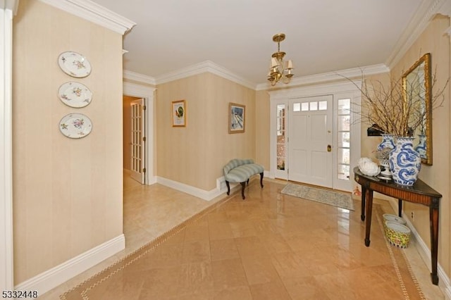 entryway featuring an inviting chandelier and ornamental molding