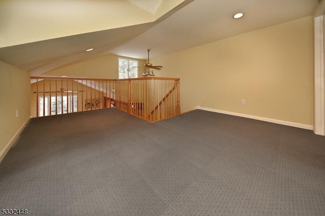 bonus room featuring ceiling fan, carpet, and lofted ceiling