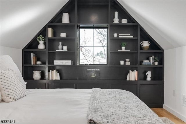 bedroom featuring hardwood / wood-style floors