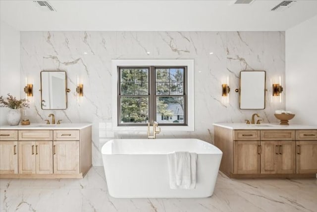 bathroom featuring a bathtub and vanity