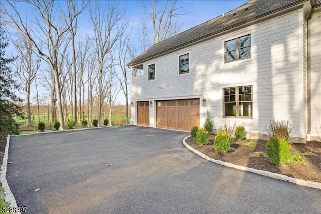 view of home's exterior with a garage