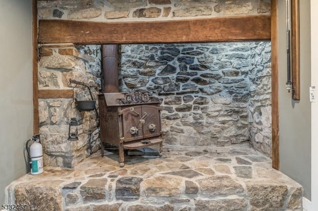 interior details featuring a wood stove