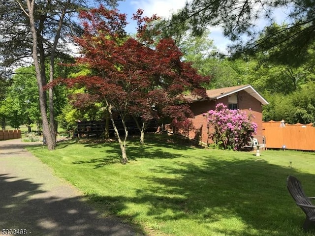 view of yard featuring fence