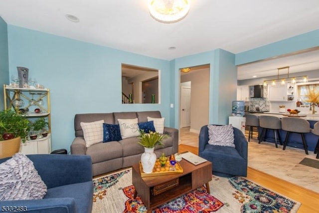 living room with light hardwood / wood-style floors