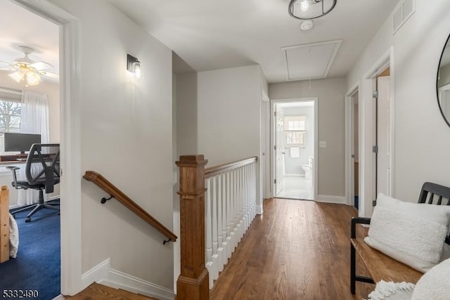 corridor featuring hardwood / wood-style floors