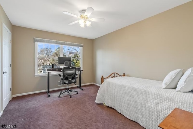 bedroom featuring ceiling fan and carpet