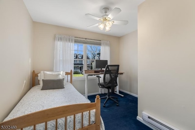 carpeted bedroom featuring ceiling fan and a baseboard radiator