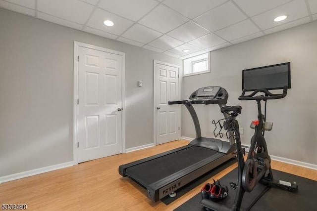 workout area featuring hardwood / wood-style flooring