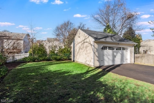 garage with a lawn