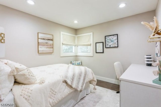 bedroom featuring light hardwood / wood-style flooring