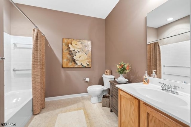 full bathroom featuring toilet, shower / bath combo, and vanity