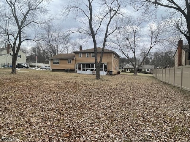 view of yard with a sunroom