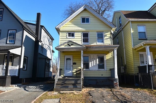 view of property featuring a porch