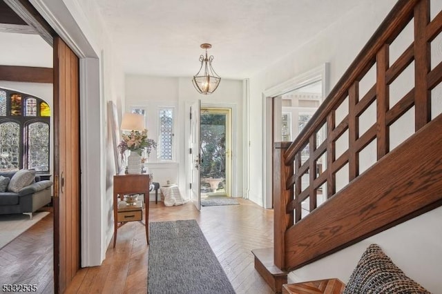 foyer featuring light parquet floors