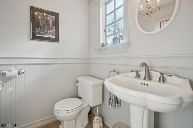 bathroom featuring sink and toilet